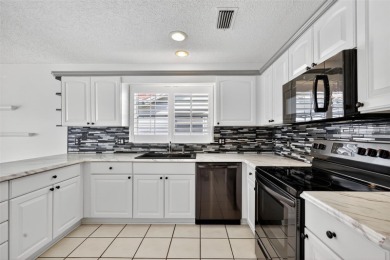 One or more photo(s) has been virtually staged. STUNNING, 3/2 on El Diablo Executive Golf Course in Florida - for sale on GolfHomes.com, golf home, golf lot