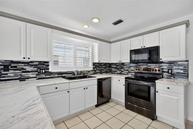 One or more photo(s) has been virtually staged. STUNNING, 3/2 on El Diablo Executive Golf Course in Florida - for sale on GolfHomes.com, golf home, golf lot