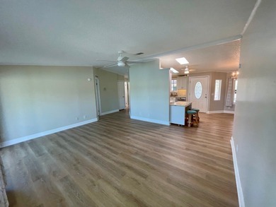 This Water View/Golf Course View Home has been renovated by the on Water Oak Country Club Estates in Florida - for sale on GolfHomes.com, golf home, golf lot