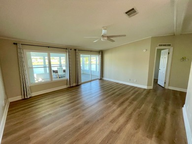 This Water View/Golf Course View Home has been renovated by the on Water Oak Country Club Estates in Florida - for sale on GolfHomes.com, golf home, golf lot