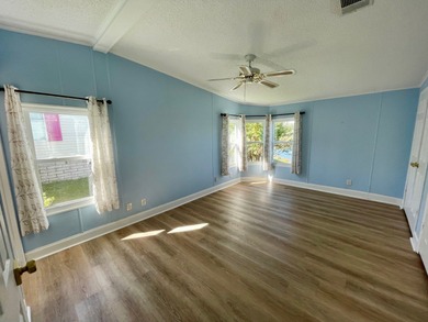 This Water View/Golf Course View Home has been renovated by the on Water Oak Country Club Estates in Florida - for sale on GolfHomes.com, golf home, golf lot