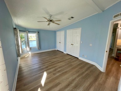 This Water View/Golf Course View Home has been renovated by the on Water Oak Country Club Estates in Florida - for sale on GolfHomes.com, golf home, golf lot