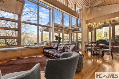 Live behind the gates of Wildcat Cliffs Country Club. Perfectly on Wildcat Cliffs Country Club in North Carolina - for sale on GolfHomes.com, golf home, golf lot