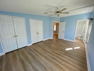 This Water View/Golf Course View Home has been renovated by the on Water Oak Country Club Estates in Florida - for sale on GolfHomes.com, golf home, golf lot