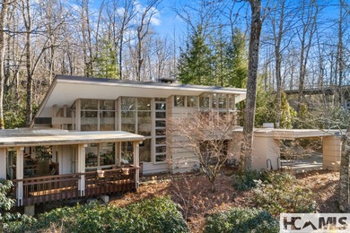 Live behind the gates of Wildcat Cliffs Country Club. Perfectly on Wildcat Cliffs Country Club in North Carolina - for sale on GolfHomes.com, golf home, golf lot