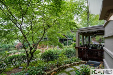 Live behind the gates of Wildcat Cliffs Country Club. Perfectly on Wildcat Cliffs Country Club in North Carolina - for sale on GolfHomes.com, golf home, golf lot