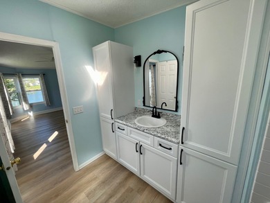 This Water View/Golf Course View Home has been renovated by the on Water Oak Country Club Estates in Florida - for sale on GolfHomes.com, golf home, golf lot