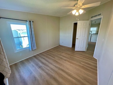 This Water View/Golf Course View Home has been renovated by the on Water Oak Country Club Estates in Florida - for sale on GolfHomes.com, golf home, golf lot