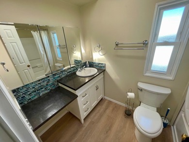 This Water View/Golf Course View Home has been renovated by the on Water Oak Country Club Estates in Florida - for sale on GolfHomes.com, golf home, golf lot