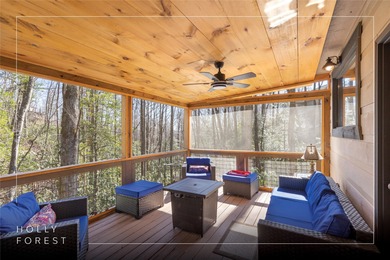 Step into the Highlands-Cashiers Plateau lifestyle with this on Sapphire National Golf Club in North Carolina - for sale on GolfHomes.com, golf home, golf lot