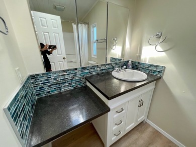 This Water View/Golf Course View Home has been renovated by the on Water Oak Country Club Estates in Florida - for sale on GolfHomes.com, golf home, golf lot