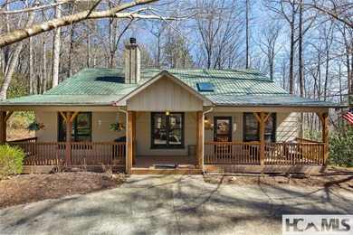 Step into the Highlands-Cashiers Plateau lifestyle with this on Sapphire National Golf Club in North Carolina - for sale on GolfHomes.com, golf home, golf lot