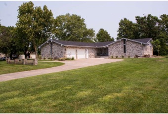 This beautifully fully remodeled Ranch style brick home is the on Hesston Golf Park in Kansas - for sale on GolfHomes.com, golf home, golf lot