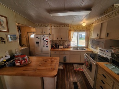 SELLER WILL PAY 1 YR. GOLF MEMBERSHIP also Golf Cart Included!!! on Rolling Greens Executive Golf Community in Florida - for sale on GolfHomes.com, golf home, golf lot