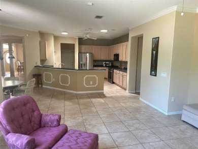 GREAT 3/2 CBS KINGSTON MODEL LOCATED IN CASTLE PINES ON A VERY on Eagle Ridge At Spruce Creek Country Club in Florida - for sale on GolfHomes.com, golf home, golf lot