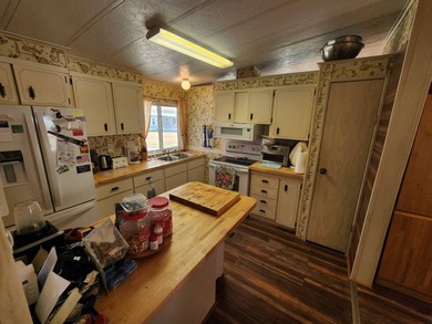 SELLER WILL PAY 1 YR. GOLF MEMBERSHIP also Golf Cart Included!!! on Rolling Greens Executive Golf Community in Florida - for sale on GolfHomes.com, golf home, golf lot