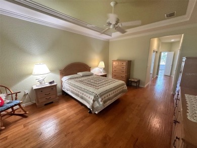 GREAT 3/2 CBS KINGSTON MODEL LOCATED IN CASTLE PINES ON A VERY on Eagle Ridge At Spruce Creek Country Club in Florida - for sale on GolfHomes.com, golf home, golf lot