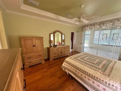 GREAT 3/2 CBS KINGSTON MODEL LOCATED IN CASTLE PINES ON A VERY on Eagle Ridge At Spruce Creek Country Club in Florida - for sale on GolfHomes.com, golf home, golf lot