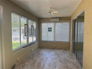 GREAT 3/2 CBS KINGSTON MODEL LOCATED IN CASTLE PINES ON A VERY on Eagle Ridge At Spruce Creek Country Club in Florida - for sale on GolfHomes.com, golf home, golf lot