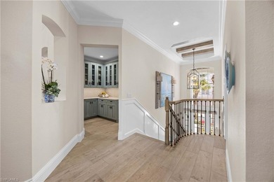 This stunning 2,748 sq. ft. three-bedroom plus den residence on Pelican Marsh Golf Club in Florida - for sale on GolfHomes.com, golf home, golf lot