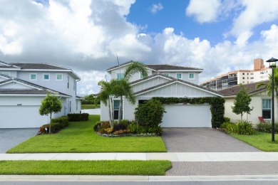 Stunning, move-in ready home with long lake views in the 55+ on Marina Lakes Golf Course in Florida - for sale on GolfHomes.com, golf home, golf lot