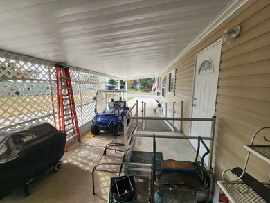 SELLER WILL PAY 1 YR. GOLF MEMBERSHIP also Golf Cart Included!!! on Rolling Greens Executive Golf Community in Florida - for sale on GolfHomes.com, golf home, golf lot