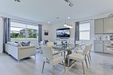 Stunning, move-in ready home with long lake views in the 55+ on Marina Lakes Golf Course in Florida - for sale on GolfHomes.com, golf home, golf lot