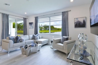 Stunning, move-in ready home with long lake views in the 55+ on Marina Lakes Golf Course in Florida - for sale on GolfHomes.com, golf home, golf lot