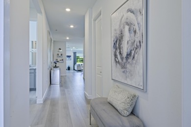 Stunning, move-in ready home with long lake views in the 55+ on Marina Lakes Golf Course in Florida - for sale on GolfHomes.com, golf home, golf lot