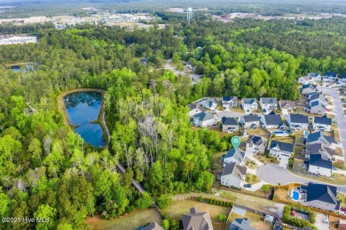 Located on a cul-de-sac lot backing up to the woods, this 5 on Olde Point Golf and Country Club in North Carolina - for sale on GolfHomes.com, golf home, golf lot