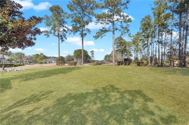 Enjoy serene views of the 8th green of the Okatie Creek golf on Hidden Cypress Golf Club in South Carolina - for sale on GolfHomes.com, golf home, golf lot