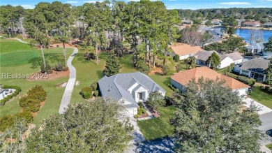 Enjoy serene views of the 8th green of the Okatie Creek golf on Hidden Cypress Golf Club in South Carolina - for sale on GolfHomes.com, golf home, golf lot