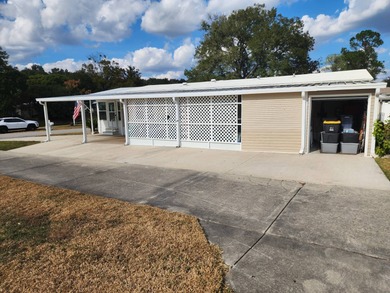 SELLER WILL PAY 1 YR. GOLF MEMBERSHIP also Golf Cart Included!!! on Rolling Greens Executive Golf Community in Florida - for sale on GolfHomes.com, golf home, golf lot