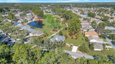 Enjoy serene views of the 8th green of the Okatie Creek golf on Hidden Cypress Golf Club in South Carolina - for sale on GolfHomes.com, golf home, golf lot