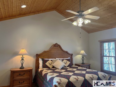 Step into this exceptional multifamily duplex home, nestled in on Trillium Links in North Carolina - for sale on GolfHomes.com, golf home, golf lot