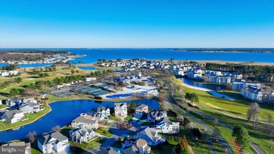 The welcoming covered entry of 33418 Islander Drive invites you on The Peninsula Golf and Country Club in Delaware - for sale on GolfHomes.com, golf home, golf lot