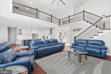 The welcoming covered entry of 33418 Islander Drive invites you on The Peninsula Golf and Country Club in Delaware - for sale on GolfHomes.com, golf home, golf lot