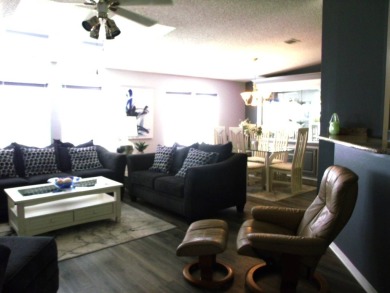 Discover this stunning 3-bedroom Palm Harbor home, offering a on Schalamar Creek Golf and Country Club in Florida - for sale on GolfHomes.com, golf home, golf lot