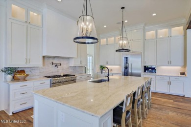 Discover resort-style living just minutes away from the on Reunion Golf Club in Mississippi - for sale on GolfHomes.com, golf home, golf lot