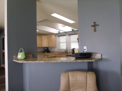 Discover this stunning 3-bedroom Palm Harbor home, offering a on Schalamar Creek Golf and Country Club in Florida - for sale on GolfHomes.com, golf home, golf lot