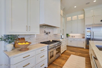 Discover resort-style living just minutes away from the on Reunion Golf Club in Mississippi - for sale on GolfHomes.com, golf home, golf lot