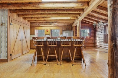 This Authentic Log Cabin Kept in It's Original Condition on The Highlands Course at Lake Arrowhead in Georgia - for sale on GolfHomes.com, golf home, golf lot