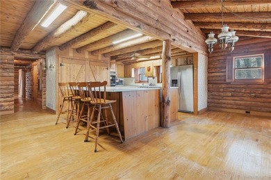 This Authentic Log Cabin Kept in It's Original Condition on The Highlands Course at Lake Arrowhead in Georgia - for sale on GolfHomes.com, golf home, golf lot