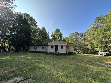 Opportunity awaits at 707 Pebblebrook Road in Woodbury on Pebblebrook Golf Club in Georgia - for sale on GolfHomes.com, golf home, golf lot