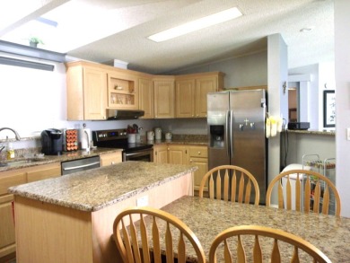 Discover this stunning 3-bedroom Palm Harbor home, offering a on Schalamar Creek Golf and Country Club in Florida - for sale on GolfHomes.com, golf home, golf lot
