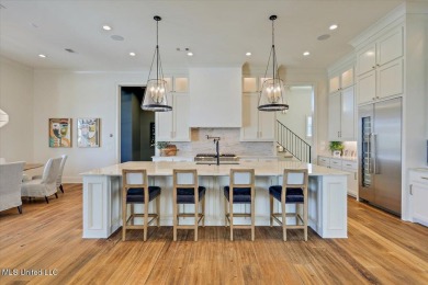 Discover resort-style living just minutes away from the on Reunion Golf Club in Mississippi - for sale on GolfHomes.com, golf home, golf lot