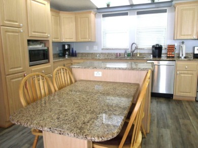 Discover this stunning 3-bedroom Palm Harbor home, offering a on Schalamar Creek Golf and Country Club in Florida - for sale on GolfHomes.com, golf home, golf lot