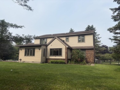 Located in highly desirable subdivision along the golf course, a on Alpena Golf Course in Michigan - for sale on GolfHomes.com, golf home, golf lot