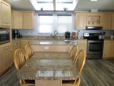 Discover this stunning 3-bedroom Palm Harbor home, offering a on Schalamar Creek Golf and Country Club in Florida - for sale on GolfHomes.com, golf home, golf lot