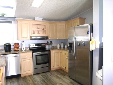 Discover this stunning 3-bedroom Palm Harbor home, offering a on Schalamar Creek Golf and Country Club in Florida - for sale on GolfHomes.com, golf home, golf lot